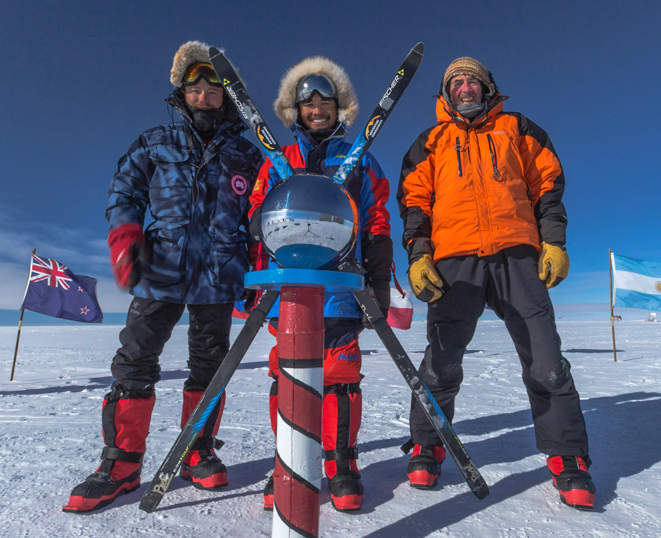 Reaching the South Pole after crossing 60 nautical miles of Antarctic wilderness, photo by Andy Cole.