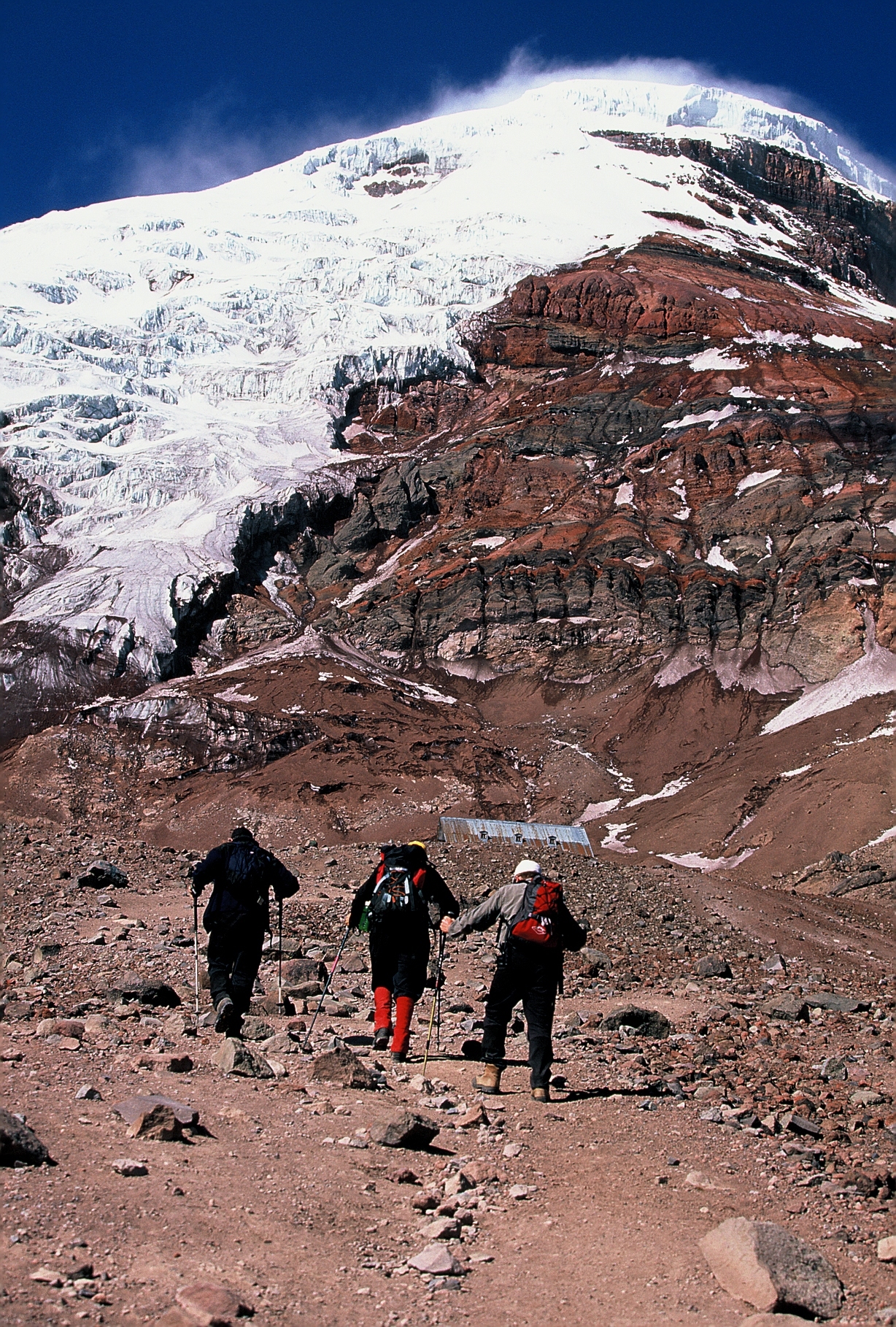 Climbers trek towards hanging glaciers on Ecuador Volcanoes