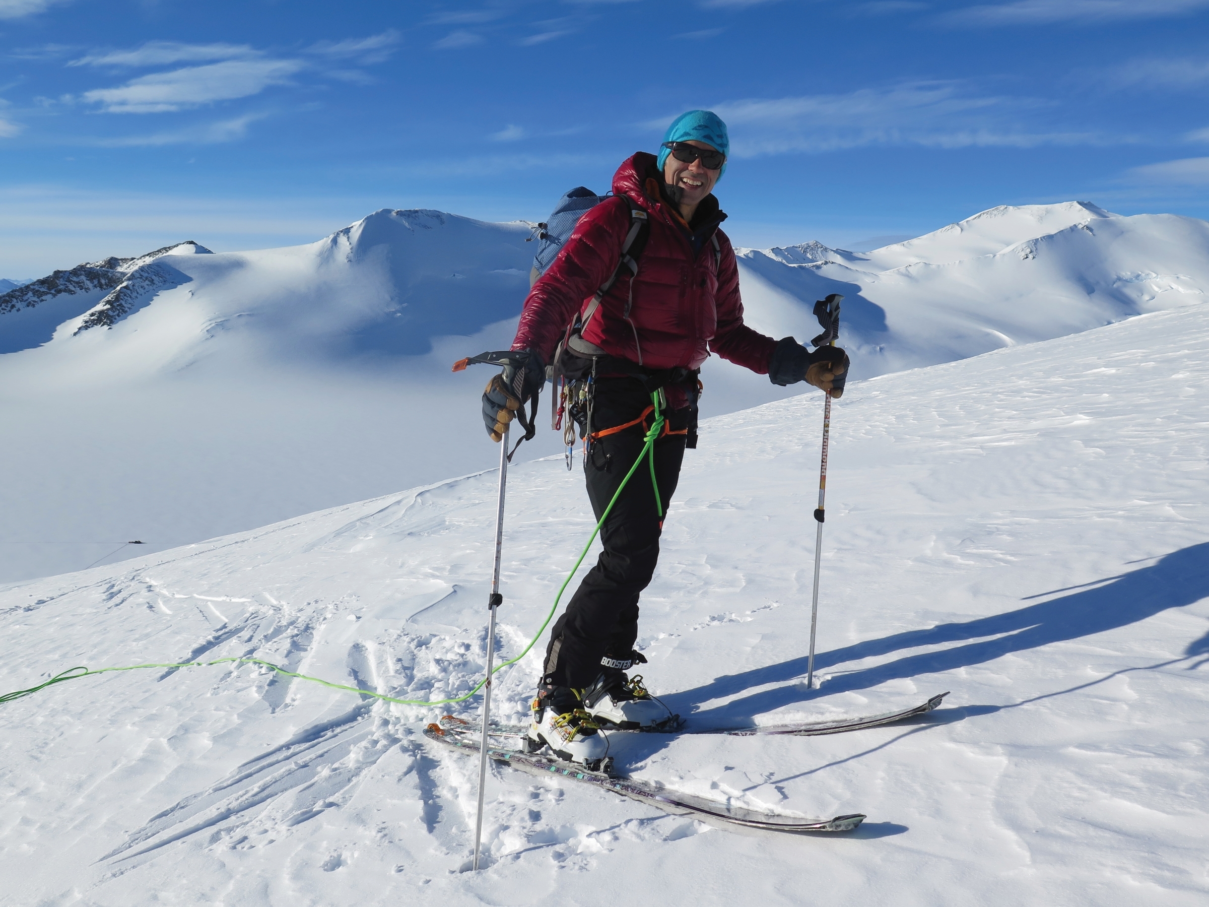 A skier with a big smile in Antarctica