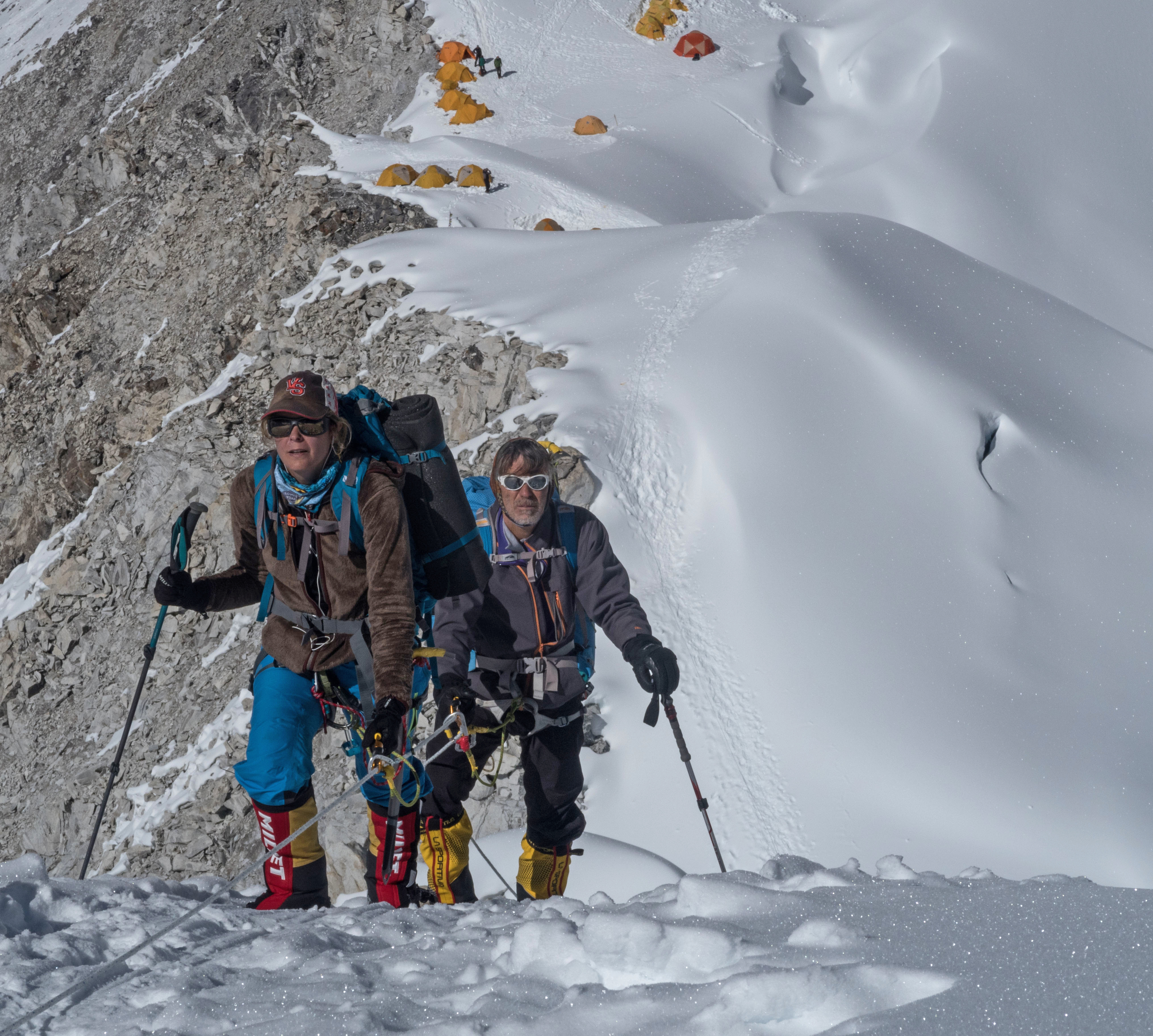 Climbers leave Camp 1 enroute to Camp 2 climbing Cho Oyu