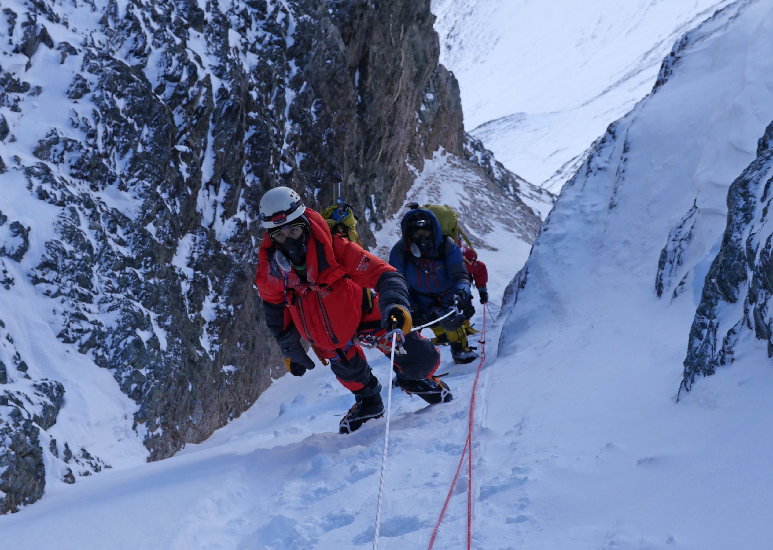 Climbers exiting narrowest part of Lhotse couloir on summit day